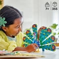 thumbnail image 3 of LEGO Creator 3 in 1 Exotic Peacock Toy, Transforms from Peacock to Dragonfly to Butterfly Toy, Play-and-Display Gift Idea for Boys and Girls Ages 7 Years Old and Up, Bird Toy, 31157, 3 of 6