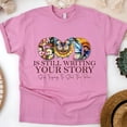 thumbnail image 1 of God Is Still Writing Your Story Christian T-Shirt Faith Graphic Tee, Azalea, Size 2XL, 1 of 6