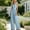 Blue, variant on Women's Solid‑Color V‑Neck Sleeveless Wide‑Leg Jumpsuit High‑Waist Cinched Waist One‑Piece Long Pants with Side Pockets Blue XL(XL)