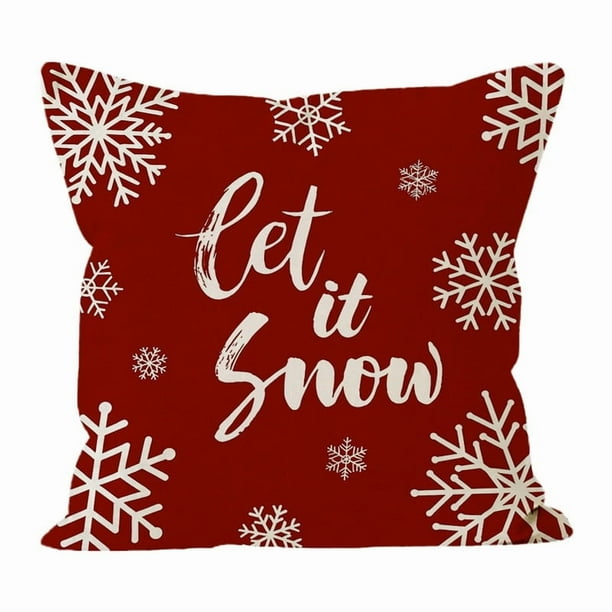 Fundas de almohada navideñas con fondo rojo y diseño de copos de nieve