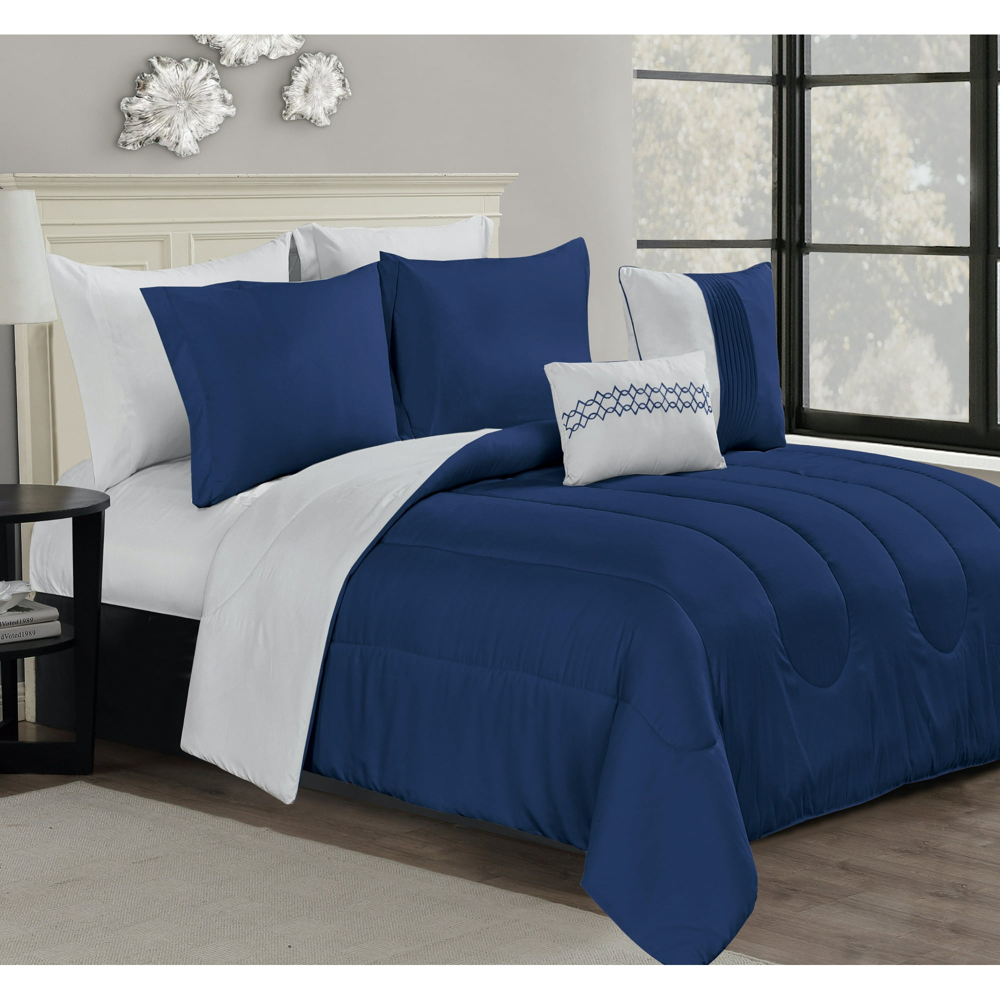 Comforter, bedskirt (3 piece), two standard pillow shams (20x26), two euro shams (26x26), and three decorative cushions with feather fill inserts (17x17, 18x18, 13x23). bedding set 7 or 9 piece solid reversible comforter set with sheet set