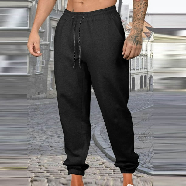 Pantalones largos para hombre, informales, a la moda, con bolsillos laterales, cintura elástica, color liso, de poliéster