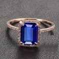 thumbnail image 1 of 1.75 Carat Blue Sapphire 7x5mm Emerald Cut And Moissanite Diamond Engagement Ring in 10k Rose Gold, 1 of 3