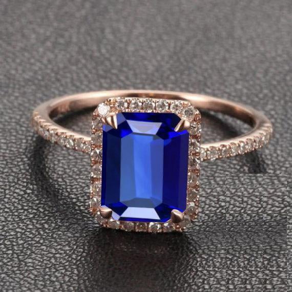 1.75 Carat Blue Sapphire 7x5mm Emerald Cut And Moissanite Diamond Engagement Ring in 10k Rose Gold