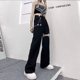 thumbnail image 4 of Pantalones de pierna ancha con agujeros de estilo Harajuku para mujer, pantalones rectos de cintura alta con cadena, ropa de calle de estilo hip hop para primavera y verano, pantalones que combinan c, 4 of 4