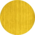 thumbnail image 1 of Ahgly Company Machine Washable Indoor Round Solid Yellow Modern Area Rugs, 7' Round, 1 of 4