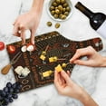thumbnail image 4 of Prehistoric Cutting Board, Aboriginal Style Patterns Tribal Motifs Objects Collage of Cave Pictures, Tempered Glass Cutting and Serving Board, Wine Bottle Shape, Orange and Black, by Ambesonne, 4 of 5