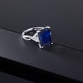 thumbnail image 4 of Gem Stone King 10.44 Cttw 10K White Gold Blue Created Sapphire and Lab Grown Diamond Engagement Ring for Women |  | Emerald Cut 14X10MM | Trillion 4MM (Size 5), 4 of 5