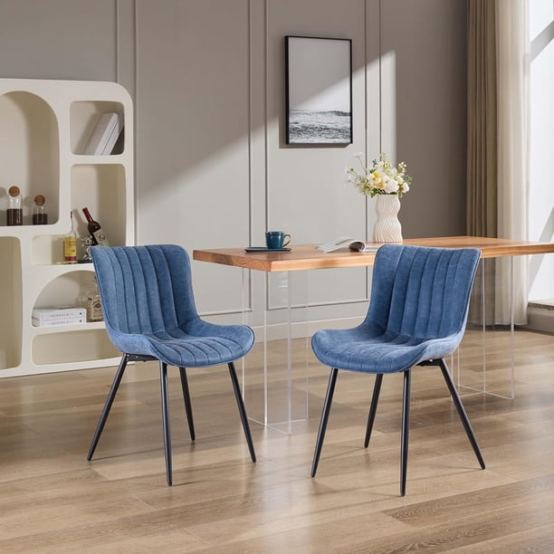Set of two blue faux - leather dining sillas featuring metal legs y comfy backrest para the dining room