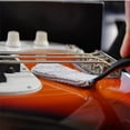 thumbnail image 3 of Cepillo de limpieza para diapasón y cuerdas de guitarra, cepillo para polvo, cepillo de limpieza de dos cabezales, accesorios para instrumentos musicales, 3 of 5