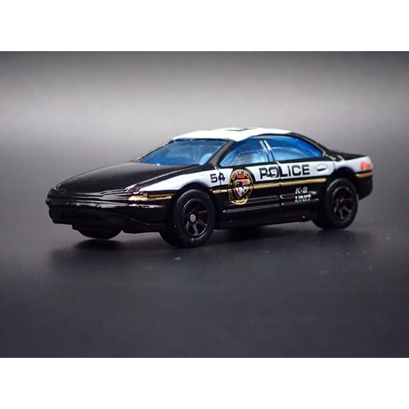 Open Box 1995-1999 OLDS OLDSMOBILE AURORA POLICE 1:64 COLLECTIBLE DIORAMA DIECAST MODEL CAR