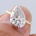 thumbnail image 6 of solitaire jewels 2.25CT Bezel Set Pear Moissanite Engagement Ring For Women, 14K Yellow Gold, 6 of 7