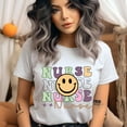thumbnail image 2 of Nurse Smiley Face Graphic T-Shirt for Women, Retro Pastel Tee, Maroon, Size S, 2 of 6