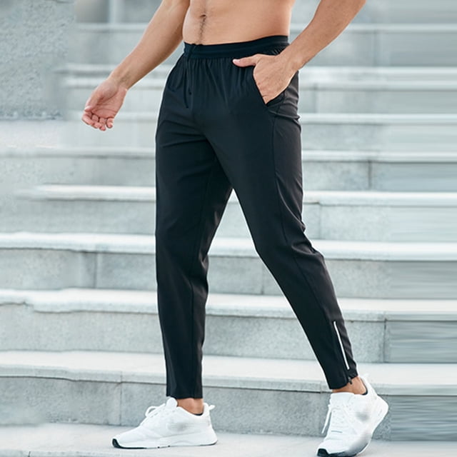 Pantalones largos para hombre, de color liso, informales, deportivos, transpirables, elásticos, para correr, entrenamiento, con cordón y cremallera, con bolsillos, de nailon.