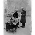thumbnail image 2 of A Bombed Out London Women Carrying A Few Belongings Talks With An Air Raids Precautions Worker. 1940 During The Battle, 2 of 2