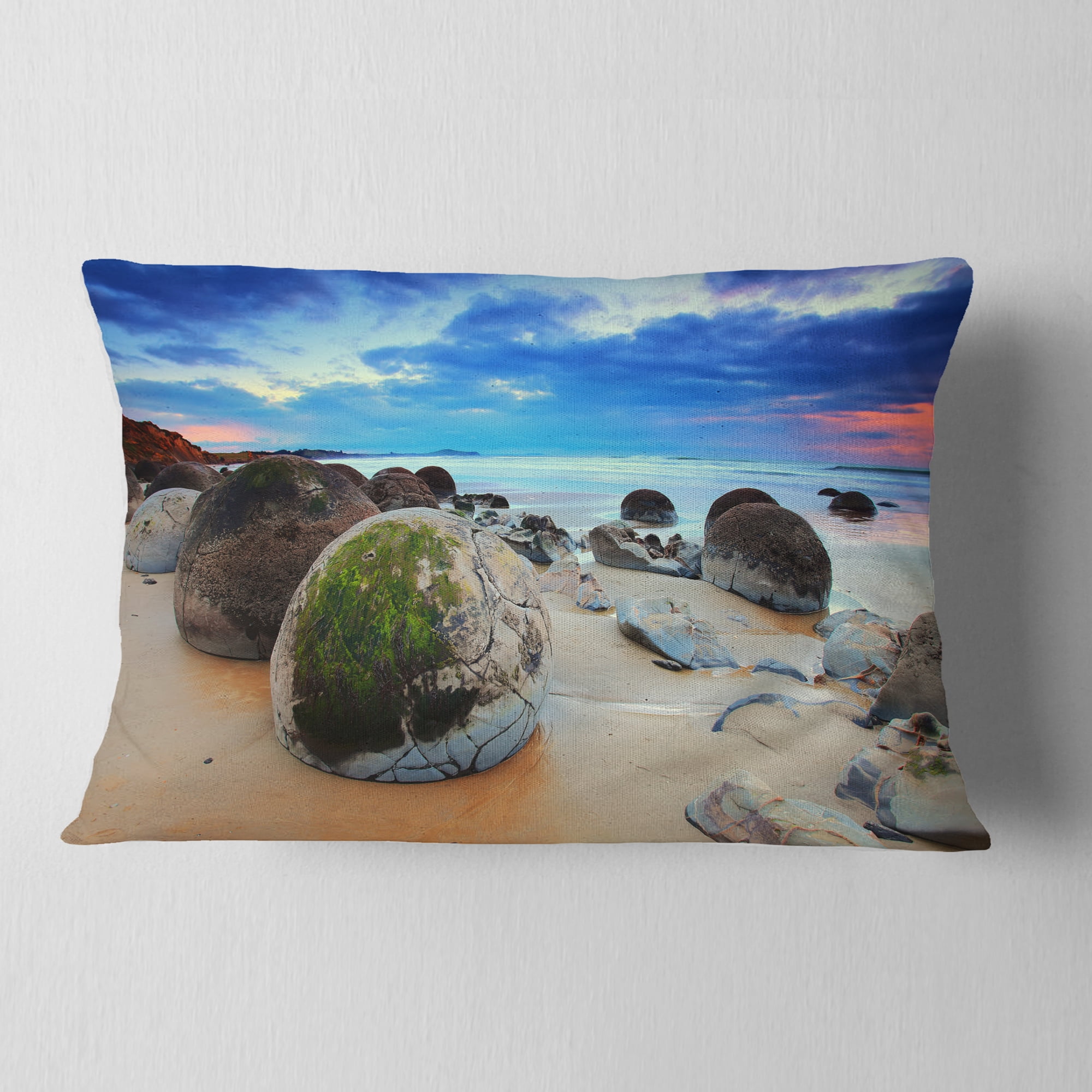 Designart Cloudy Sunrise Over Moeraki Boulders - Seashore Photo Throw Pillow - 12x20