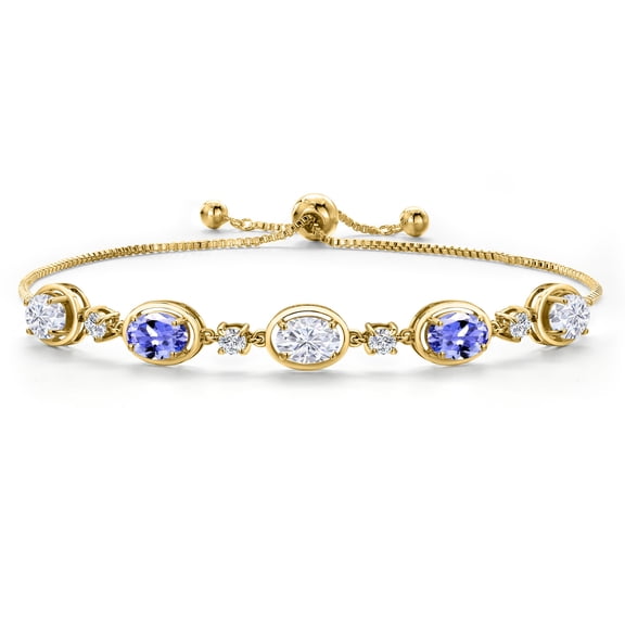 Gem Stone King 18K Yellow Gold Plated Silver White Moissanite and Blue Tanzanite Bracelet for Women | 4.20 Cttw | Gemstone Birthstone | Oval 7X5MM | Fully Adjustable 9 inch