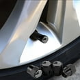 thumbnail image 1 of Capuchon de Roue de Pneu Automobile en Alliage d'Aluminium / Protection contre la Saleté / Ajustement Universel pour Voitures Motos Vélos / Style Rayé / Durable Résistant à l'Érosion / Lot de 4 / 1.5x1.2cm, 1 of 6