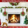 thumbnail image 6 of Guvpev 4 Pcs 15" Christmas Mini Cabinet Wreaths for Kitchen,Artificial Norfolk Pine & Cypress Wreath with Red Berry Bow for Christmas Decorations Window Door Fireplace Table Staircase Indoor Outdoor, 6 of 12