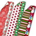 thumbnail image 1 of Hallmark Reversible Christmas Wrap Paper (Holiday Fun with Santa, Merry Messages, Peppermint, Dots, Snowmen, Stripes), 1 of 7