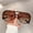 Leopard Frame Gradient Tea Lens, variant on New  Fashion High-end Sense Round Face Fashion Glasses with Leopard Pattern Frame and Double-bar Design.