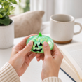 thumbnail image 2 of Halloween Pumpkin Squishy Toy, Green Glitter Jack O Lantern Stress Ball with Green Stem, Slow Rising Fidget Toy, Sensory Squeeze Ball for Adults, Halloween Party Favor Gift, 2 of 3