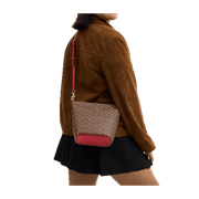 Coach Womens Logan Small Duffle Zip Crossbody Bag in Signature Canvas (Tan / Carnation)