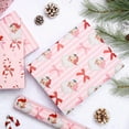 thumbnail image 3 of MetalM Reversible Pink Christmas Wrapping Paper Roll - 17 Inches X 33 Feet (47 sq. ft. ttl.) Santa Claus Bow Design with Pink Stripe, Red Gift Wrap for Xmas, Holiday, Party, 3 of 14