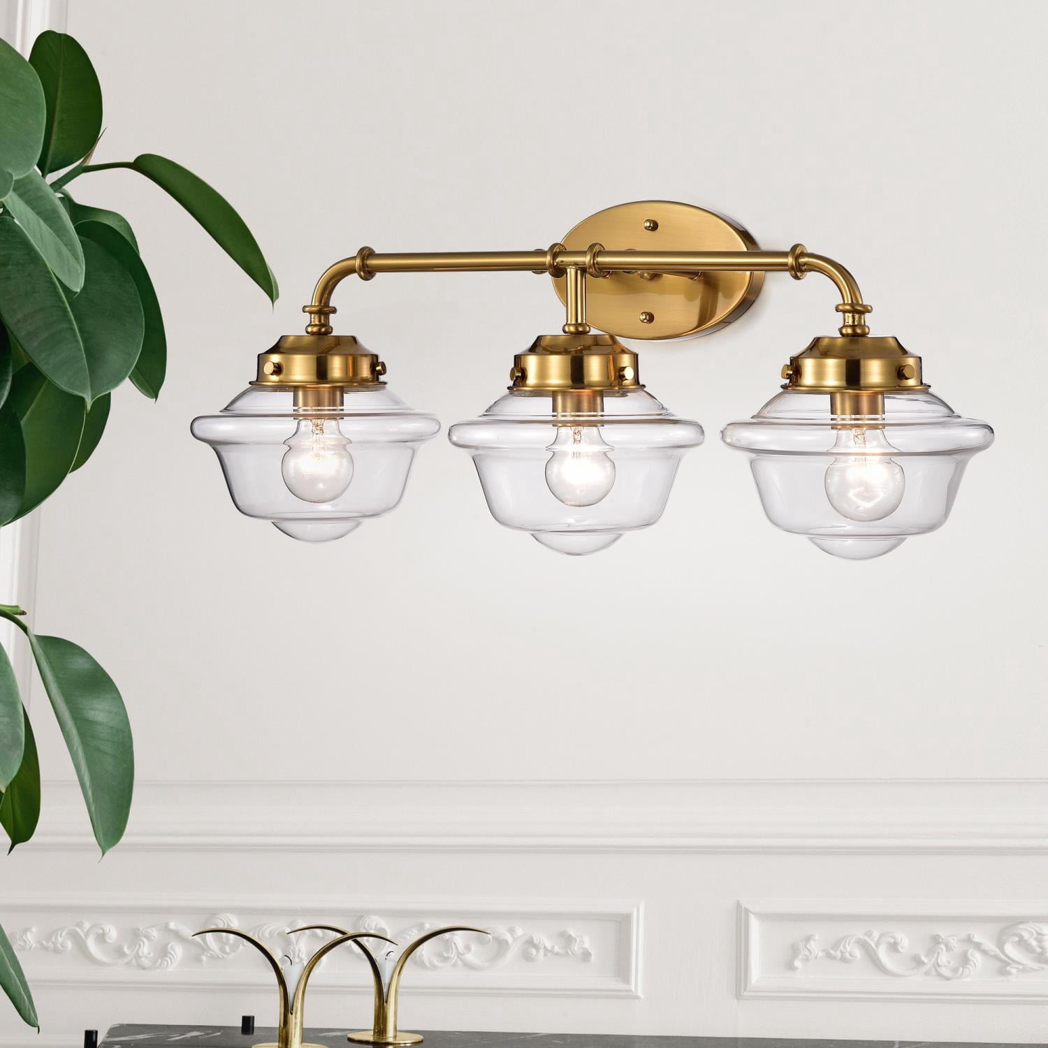 Warehouse of Tiffany Nicoline Gold 3-Light Wall Sconce with Clear Glass Shade