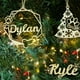 thumbnail image 4 of Colgantes huecos de Navidad con nombre, adornos de madera, huella de perro y gato de dibujos animados con nombre, decoraciones para fiestas de árboles de Navidad, regalo para niños, 4 of 5