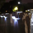 thumbnail image 1 of Lámpara 4 luces solares de pared para escalones de cubierta, decorativas para vallas y escaleras (marrón/luz cálida) Ehuebsd Nuevos Originales, 1 of 8