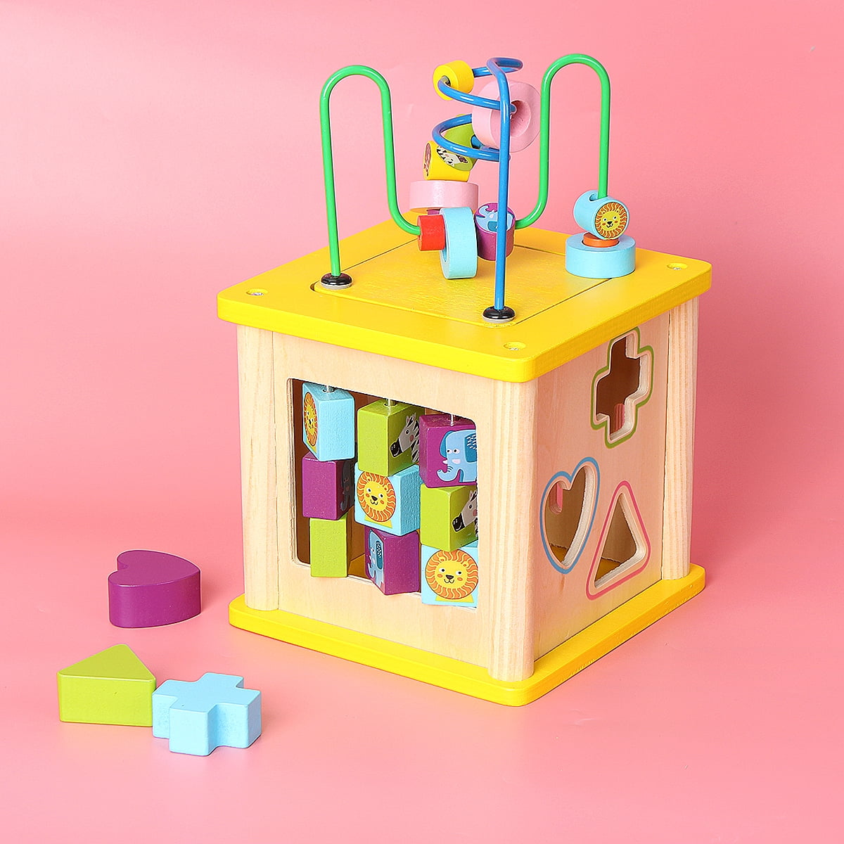 pink wooden activity cube