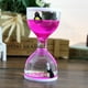 thumbnail image 2 of Reloj de arena con forma de delfín, juguete antiestrés con aceite líquido flotante y movimiento. Rosado, 2 of 9