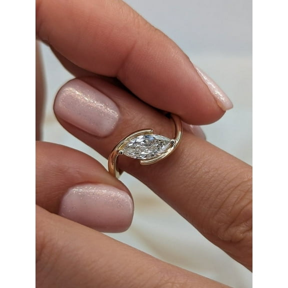 SOLITAIRE JEWELS 1Ct Elegant Marquise-Cut Moissanite Diamond Ring in 10K Yellow Gold Swirl Setting