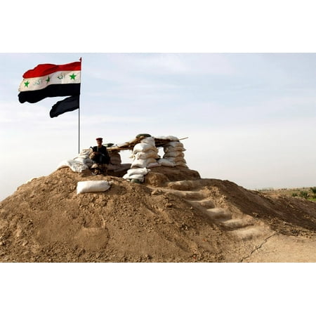 An Iraqi Army soldier stands guard at a new Iraqi guard station Poster Print by Stocktrek (Best Army Duty Stations List)
