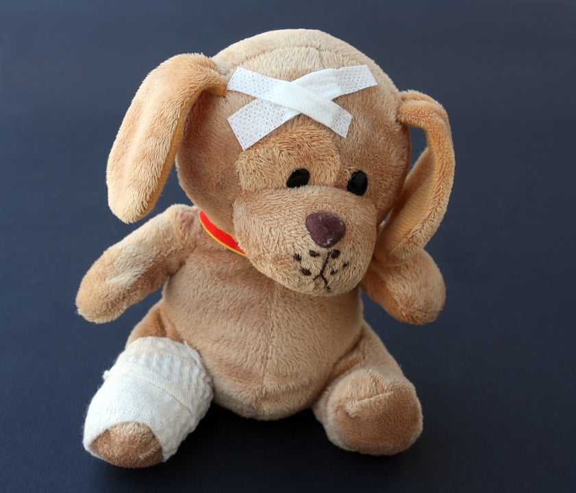 stuffed animal with broken leg