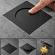 thumbnail image 4 of Diseño de tapa automática para desagüe de piso de baño, acabado negro mate que agrega un toque moderno a su espacio, asegurando un ambiente libre de olores, 4 of 6