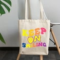 thumbnail image 2 of Keep on Smiling, Motivational Quote, Groovy Retro Wavy Text Merch Gift, 12oz Canvas Tote Bag, 2 of 3