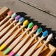 thumbnail image 5 of Cepillo de dientes de bambú para niños, cepillo de dientes de madera pintado a mano de color lila saludable, paquete diario de 10 cepillos de dientes de bambú para niños para el hogar, 5 of 6