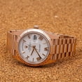 thumbnail image 2 of Pre-Owned Rolex Day-Date 40MM 228235 White Roman Dial Fluted Bezel 18K Rose Gold President Bracelet, 2 of 8
