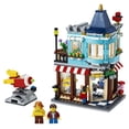 thumbnail image 3 of LEGO 31105 Creator 3-en-1 Adosada Juguetería - Pastelería - Set de construcción de floristerías, con flores y un paseo en cohete para niños de 8+ años, 3 of 8