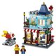 thumbnail image 3 of LEGO 31105 Creator 3-en-1 Adosada Juguetería - Pastelería - Set de construcción de floristerías, con flores y un paseo en cohete para niños de 8+ años, 3 of 8