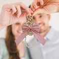 thumbnail image 3 of Pearl Bow Keychain Cute Bow Keychain Wristlet for Women, Purse Charms Pearl Keychain Pearl Key Ring Bowknot Key Chain Bracelet, 3 of 7