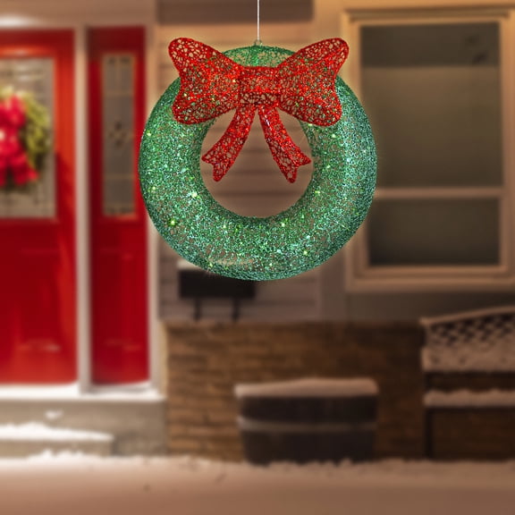 Northlight 24" LED Lighted Green Glitter Wreath with Red Bow Outdoor Christmas Decoration