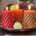 thumbnail image 4 of Twist Pillar Candles, Set of 3, Orange, Tangerine and Amber, 45 Hours Burn Time, 4 Inches, 4 of 7