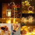 thumbnail image 2 of Juego de 2 guirnaldas de luces navideñas a pilas de 10 metros y 100 LED con control remoto y temporizador. Luces de luciérnaga con 8 modos de brillo para decoración de jardín, fiestas e interiores., 2 of 5