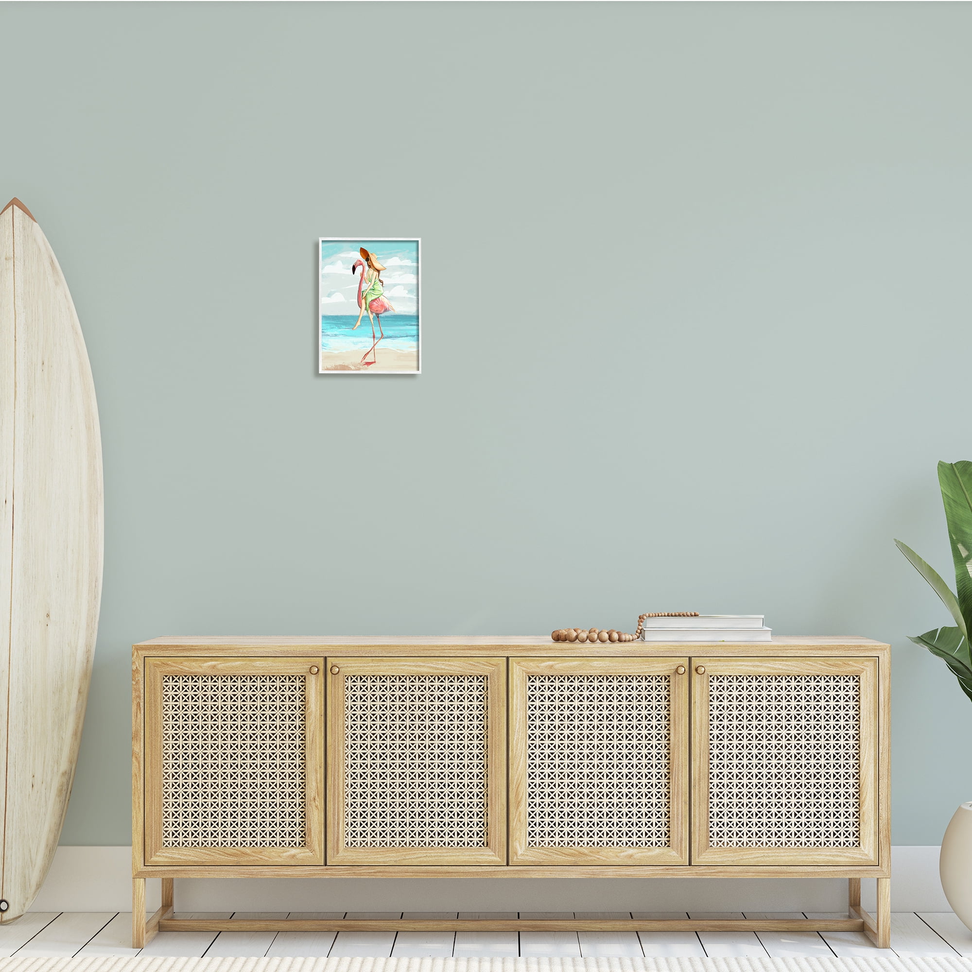 Beach Woman Riding Pink Flamingo Tall Tropical Bird 11 in x 14 in Framed Painting Art Prints, by Stupell Home Décor
