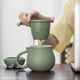 thumbnail image 4 of 1 taza de té de cerámica (verde) con infusor y tapa (301-400 ml), taza de té con lindo filtro de diseño de gato para remojar hojas sueltas, regalo para vacaciones, cumpleaños, casa cálida, 4 of 5