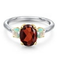 thumbnail image 3 of Gem Stone King 10K Two Tone Gold Red Garnet and Simulated White Opal Engagement Ring for Women | 2.63 Cttw | Oval 9X7MM | Gemstone January Birthstone | Size 5, 3 of 6
