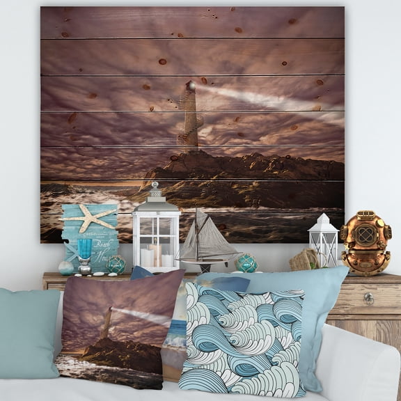 Designart 'Lighthouse Shining Light During Stormy Clouds Night I' Nautical & Coastal Print on Natural Pine Wood